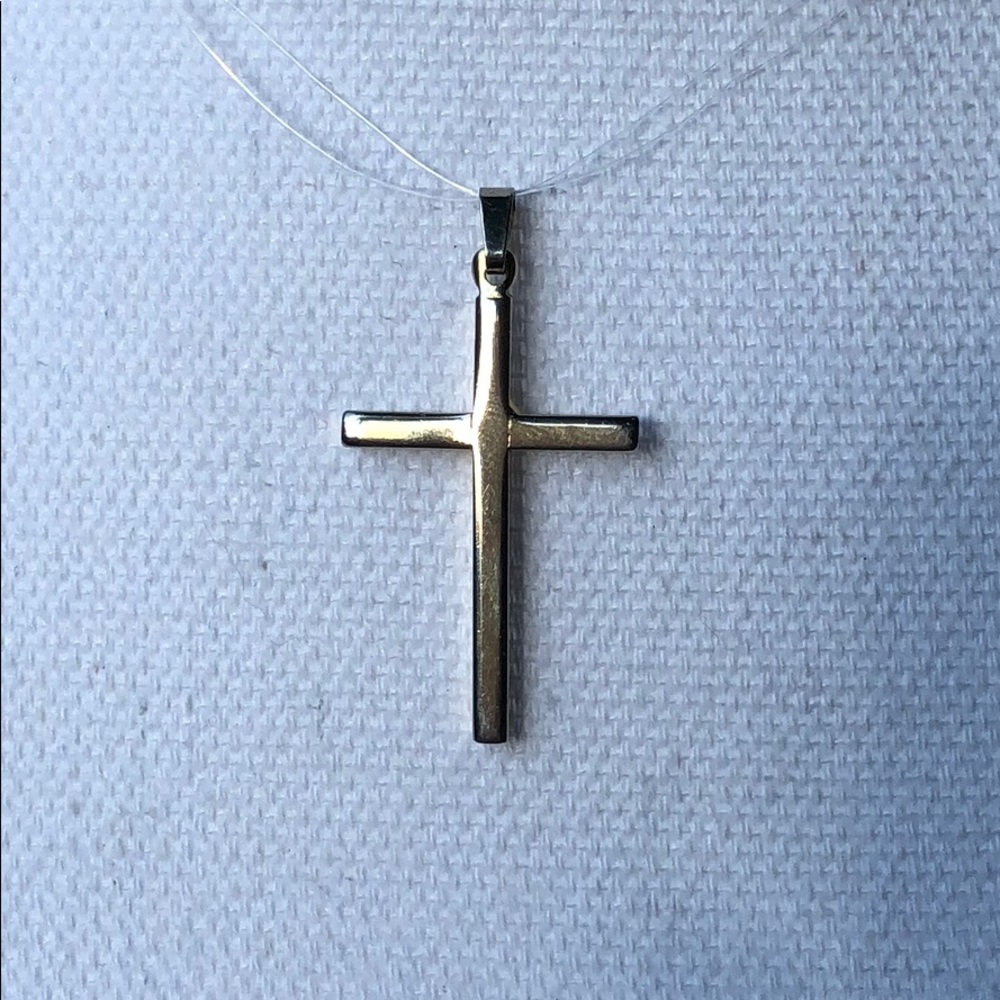 Silver tone cross pendant